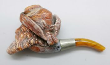 A 19th Century Meerschaum pipe with amber stem, Bavarian man with beard and hat with feather