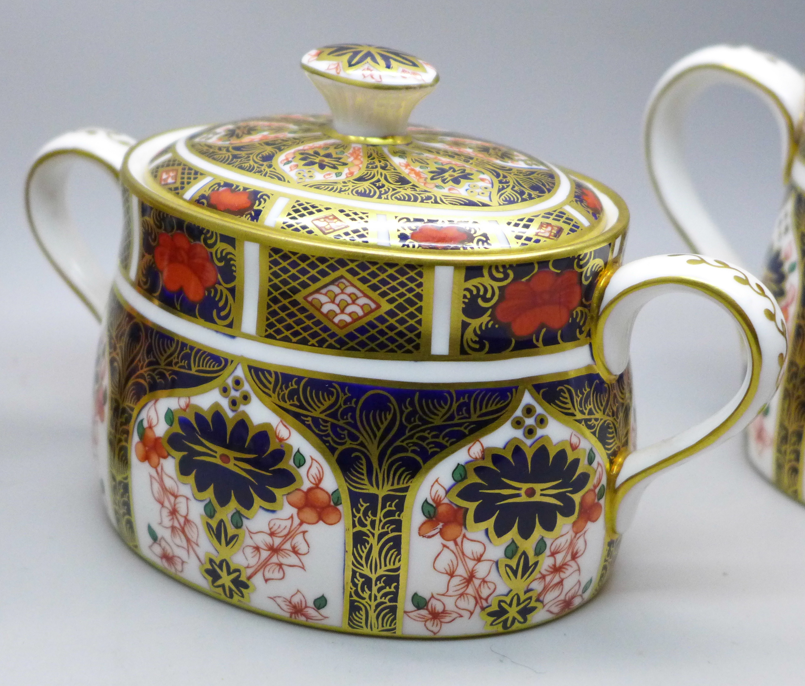 A Royal Crown Derby 1128 Imari pattern cream jug and sugar (x2), smaller milk jug second - Image 2 of 7