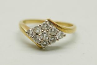 An 18ct gold and nine diamond ring, 5.3g, S/T