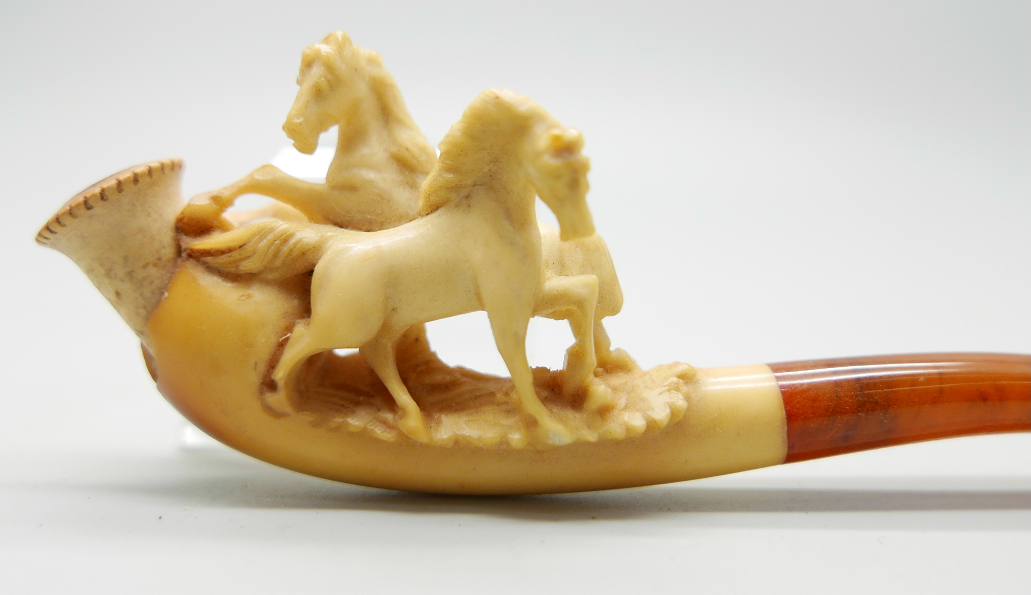 Three small hand carved Meerschaum pipes, two with horses and one with a pair of stags, amber stems, - Image 6 of 12