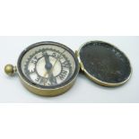 A pocket compass by Negretti & Zambra, with inscription, ''Trooper E.O. Robotham, I.Y. Jan. 10th