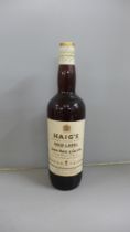 A Haig's Gold Label bottle of whisky