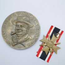 A German Third Reich War Merit Cross and a Winston Churchill medallion