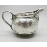 A Victorian silver jug, London 1878, 100g