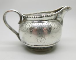 A Victorian silver jug, London 1878, 100g