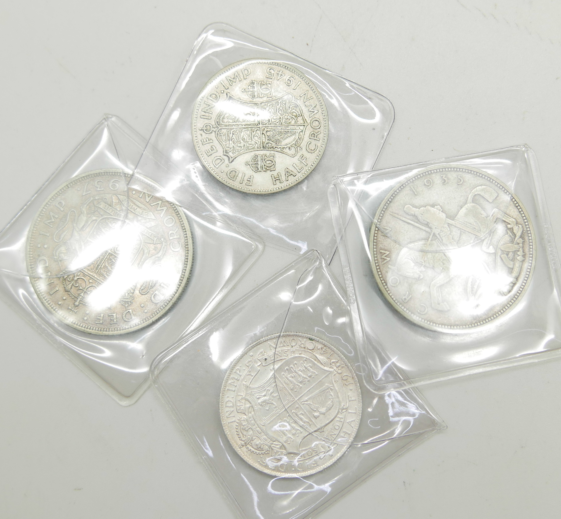 Two crowns, 1935 and 1937, a 1945 half crown and a 1914 half crown, (uncirculated) - Image 2 of 4