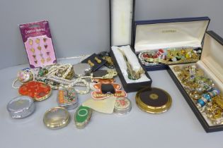 A collection of lady's pill boxes, a powder case, decorative bookmarks, a jade elephant, costume