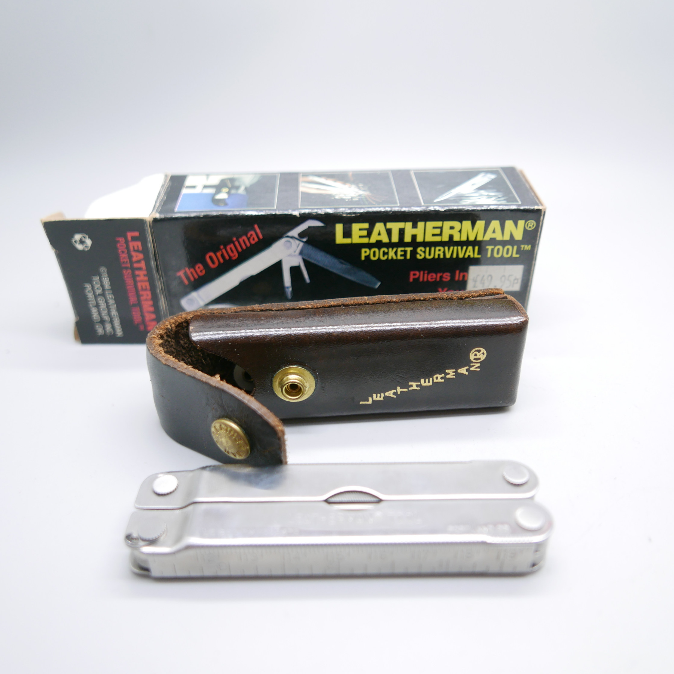 A Leatherman pocket survival tool, The Original, with leather case and outer box - Image 2 of 2