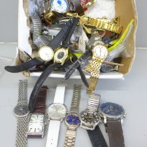 A quantity of lady's and gentleman's wristwatches; Timex, Swatch, Sekonda, etc.