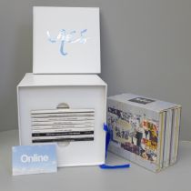 A John Lennon Signature Box compilation CD box set and The Beatles Anthology CD set
