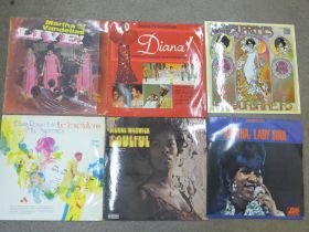 Six LP records including Aretha Franklin, Martha and The Vandellas, Diana Ross