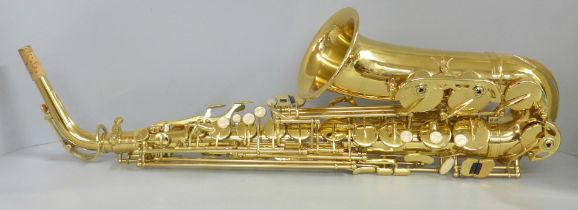 An Ammoon saxophone, cased, no mouthpiece