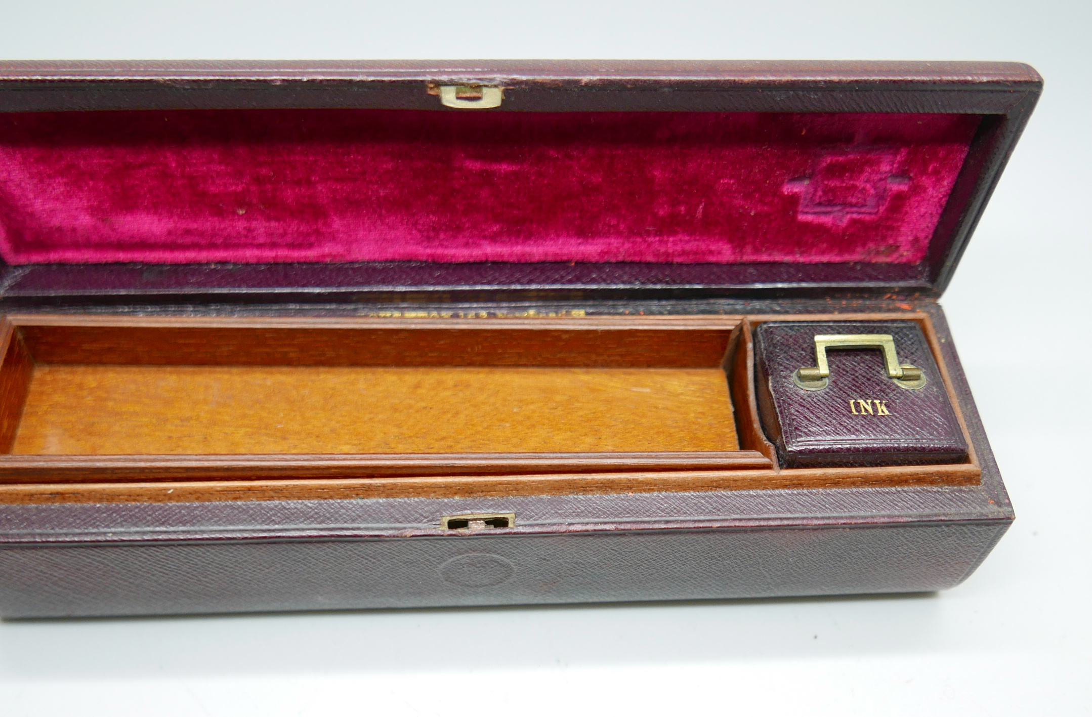 A vintage Moroccan leather pen box with small inkwell, Houghton 169 New Bond Street, inner liner box