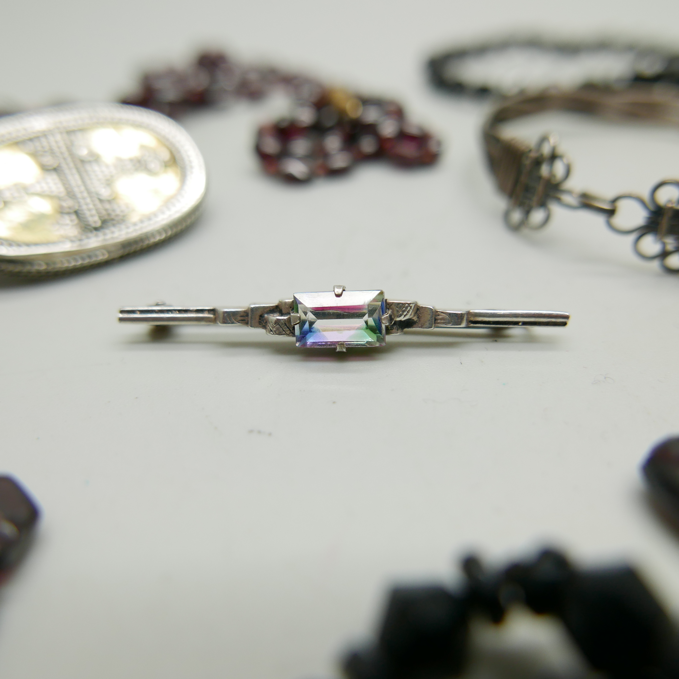 Two jet necklaces and brooch, two garnet necklaces, one a/f, three silver brooches, one white - Image 3 of 3