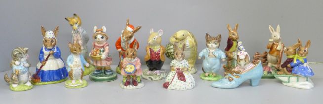 Thirteen Beatrix Potter figures, seven Royal Doulton and six Beswick and two other figures (15)