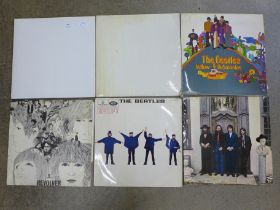 Five original The Beatles LP records including numbered White Album 273687 and White Album re-