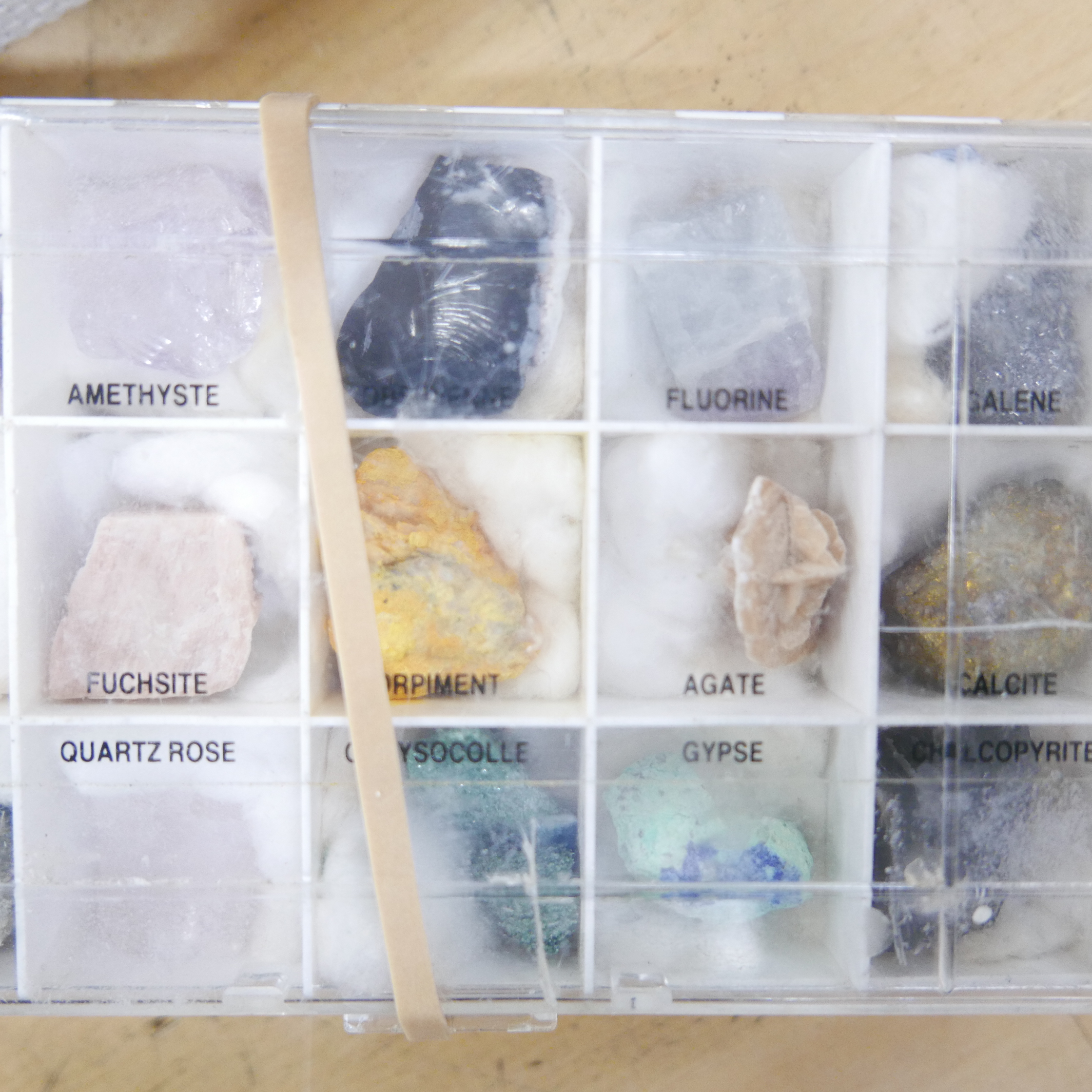 A collection of mineral and gemstone samples in plastic containers and two agate eggs **PLEASE - Image 2 of 2