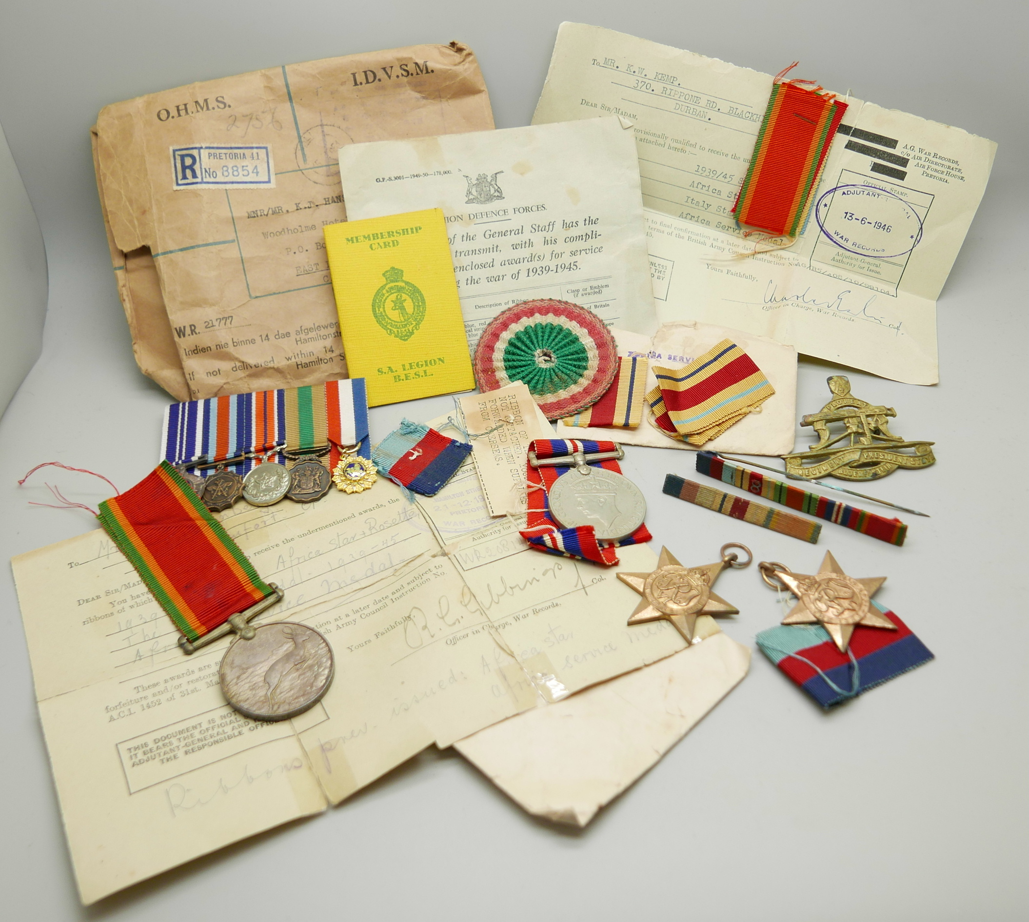 Assorted WWII medals, etc., including four to 21777 K.J. Hanssen with original address envelope