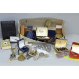 A collection of men's cufflinks, coins, a farrier's vintage horse shoe pen knife, watch and clock