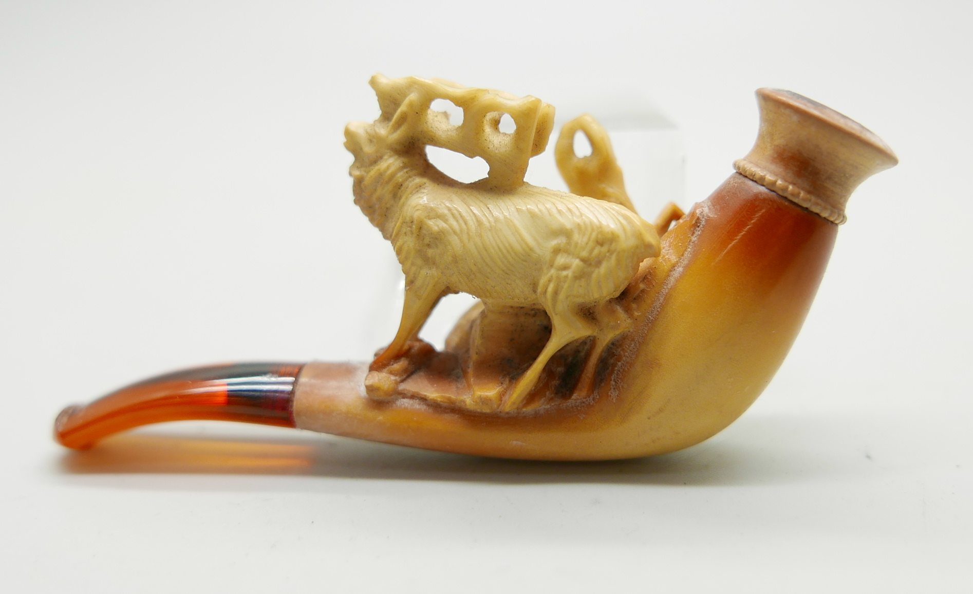 Three small hand carved Meerschaum pipes, two with horses and one with a pair of stags, amber stems, - Image 11 of 12
