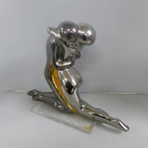 A Galos Spain pottery figure of entwined lovers on a perspex plinth in silver finish, 31cm