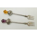 Two Scottish sterling silver pickle forks with thistle crowns, Cairngorm coloured stone