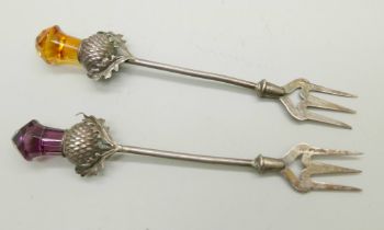Two Scottish sterling silver pickle forks with thistle crowns, Cairngorm coloured stone
