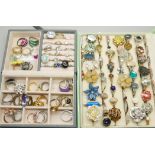 A large collection of rings, a silver and moonstone ring, rose quartz, etc., over 100