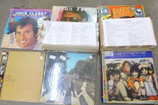 Two boxes of LP records, The Beatles Abbey Road, Elton John, Gladys Knight, The Beach Boys, etc.