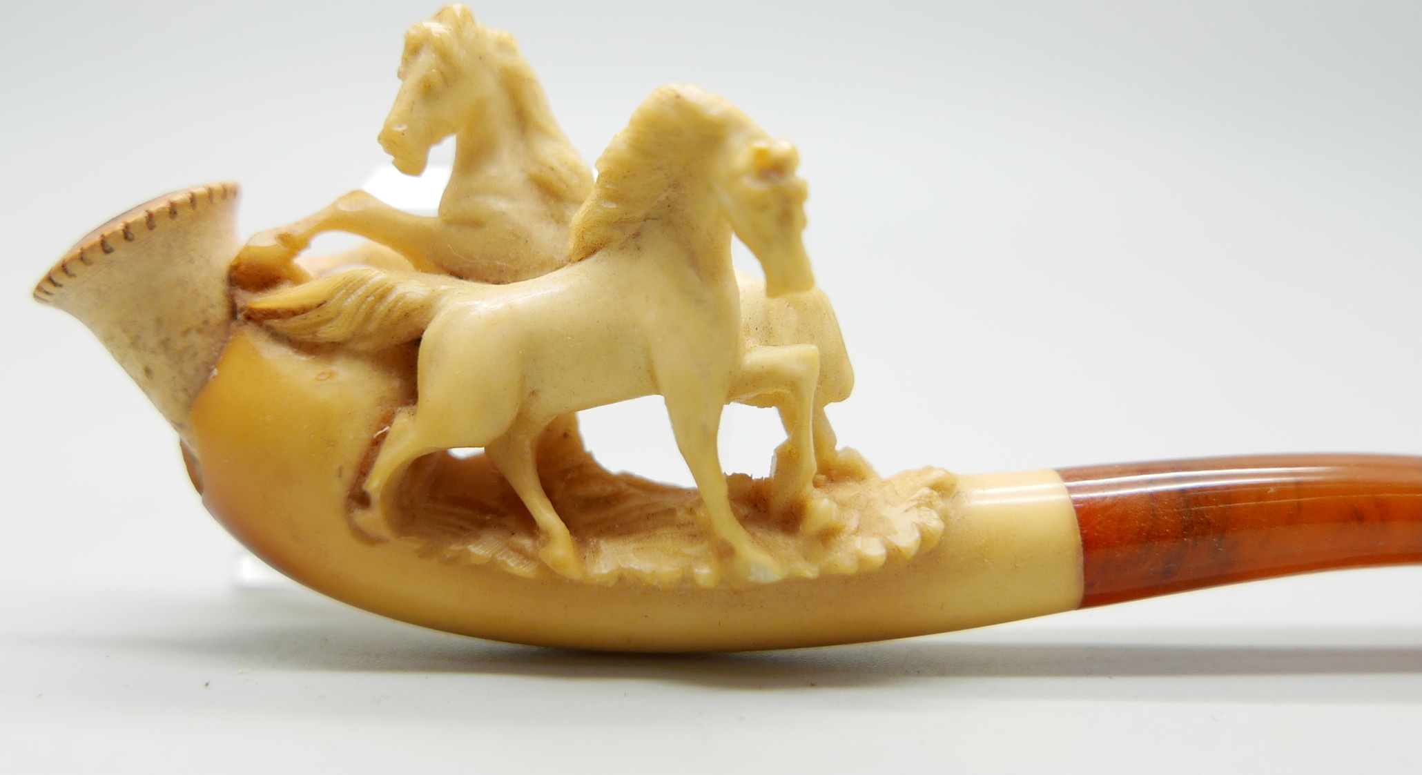 Three small hand carved Meerschaum pipes, two with horses and one with a pair of stags, amber stems, - Image 5 of 12