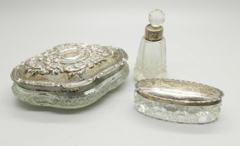 Two small silver topped dressing table pots and scent bottle, lid a/f on larger pot