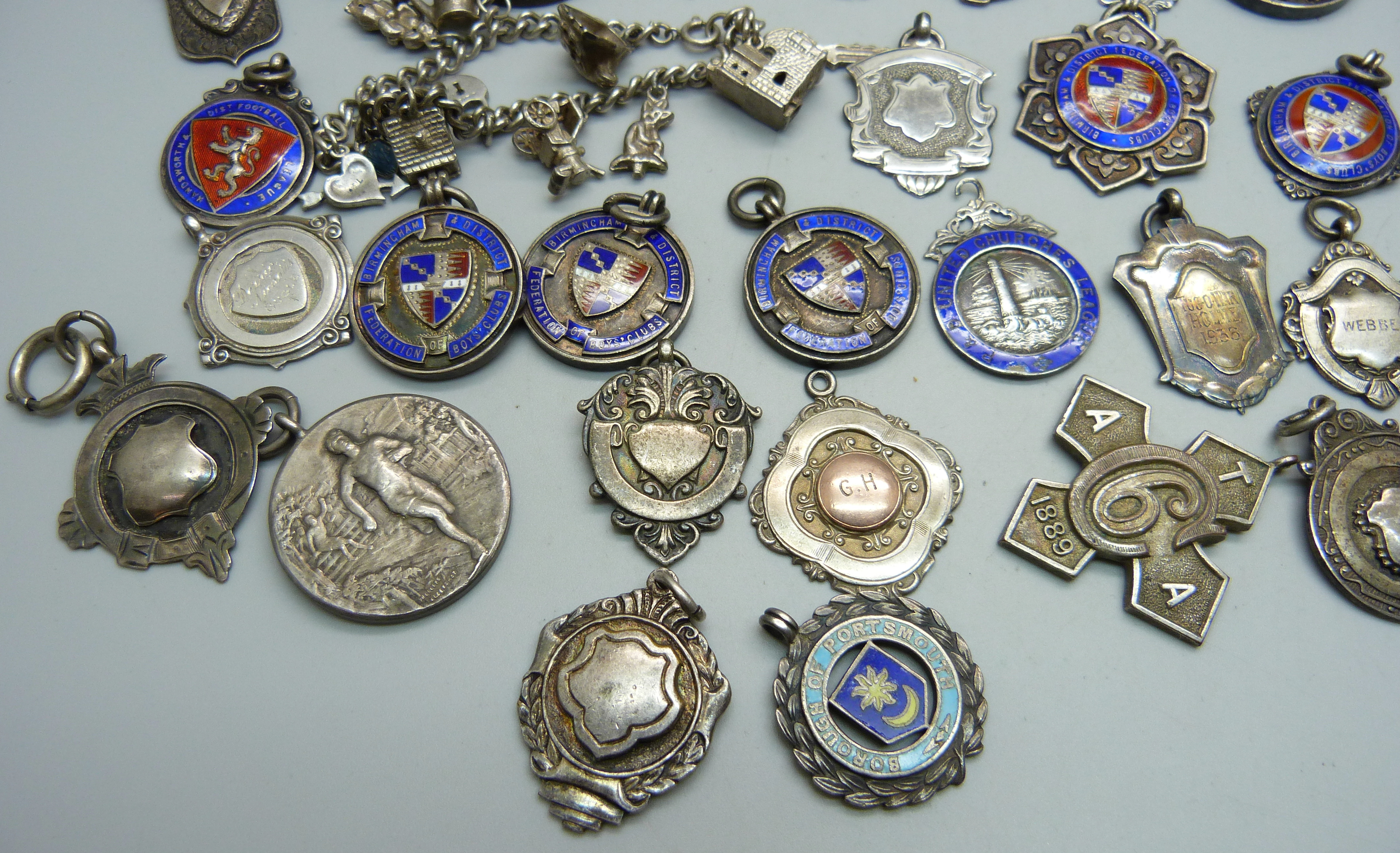 Twenty-three silver fob medals, some enamelled, 214g, four other fob medals and a charm bracelet - Image 2 of 3