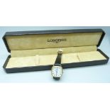 A lady's Longines quartz wristwatch on a leather strap, boxed
