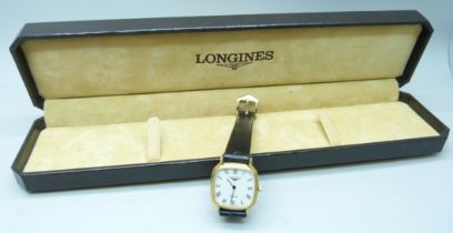 A lady's Longines quartz wristwatch on a leather strap, boxed