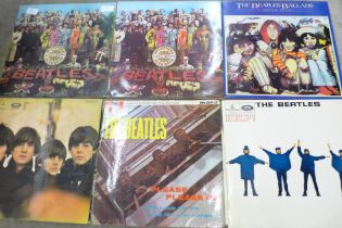 Fourteen The Beatles and solo LP records