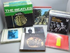 The Beatles Collection set of 7" singles, box lid missing and a plastic tub of The Beatles and