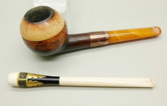 A smoker's pipe with a 9ct gold collar and a cigarette holder, both cased