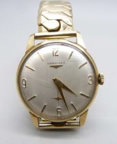 A 9ct gold cased Longines wristwatch, the case back bears inscription dated 1967, 32mm case