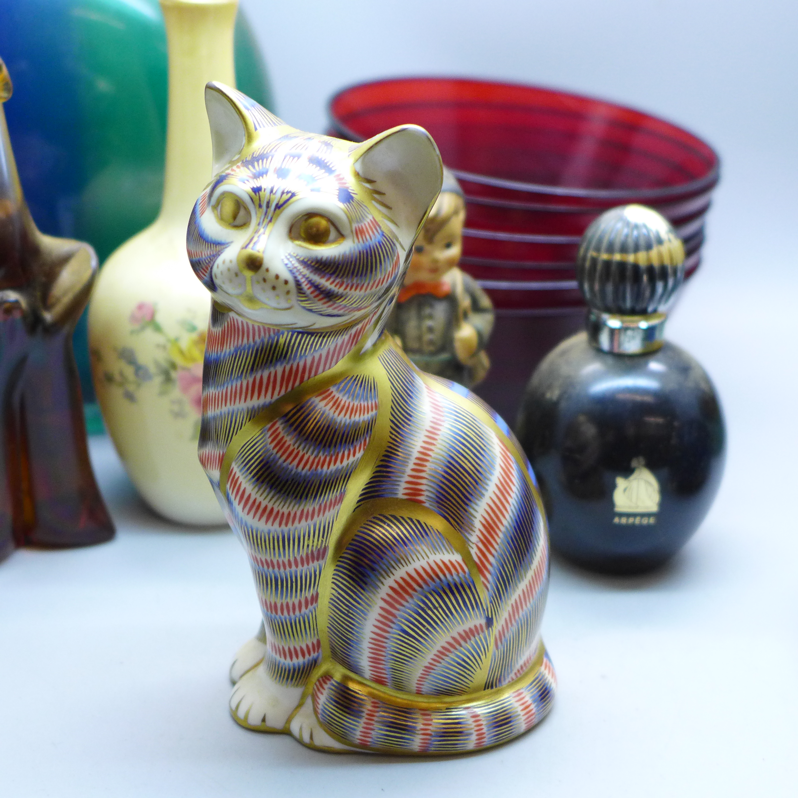 A Royal Crown Derby cat paperweight with gold stopper, a Hummel figure, a heavy cased studio glass - Image 4 of 6