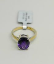 A silver gilt and amethyst solitaire ring, N