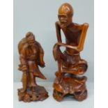Two carved wooden oriental figures, tallest 21cm, smaller figure with chip to side
