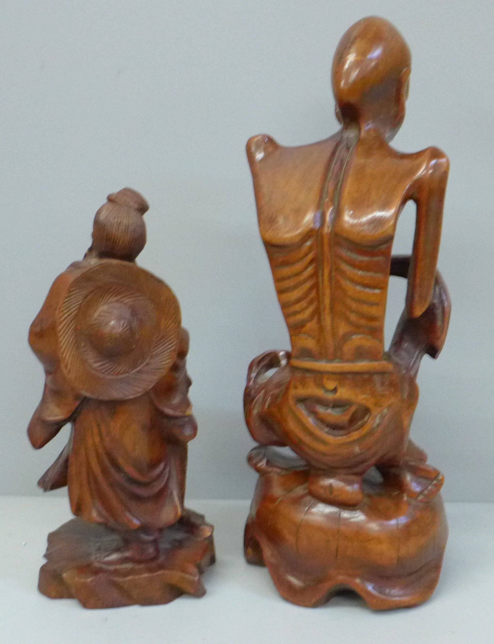 Two carved wooden oriental figures, tallest 21cm, smaller figure with chip to side - Image 4 of 4