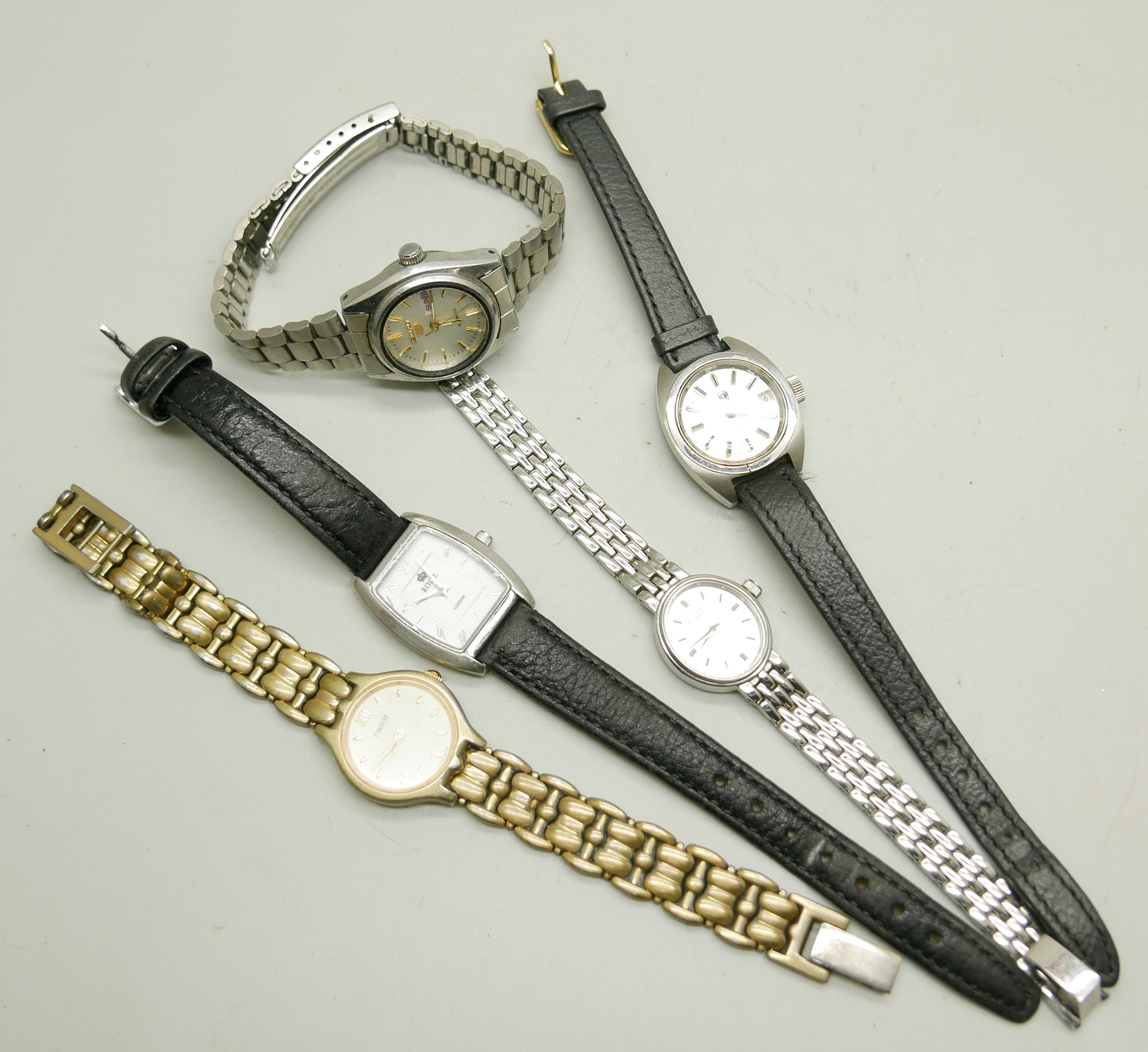 Five lady's wristwatches, Seiko 5 automatic, Tissot automatic Sea Star, a Tissot quartz, a Rotary