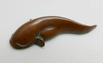 A bronze catfish, signed, 37g, 55mm