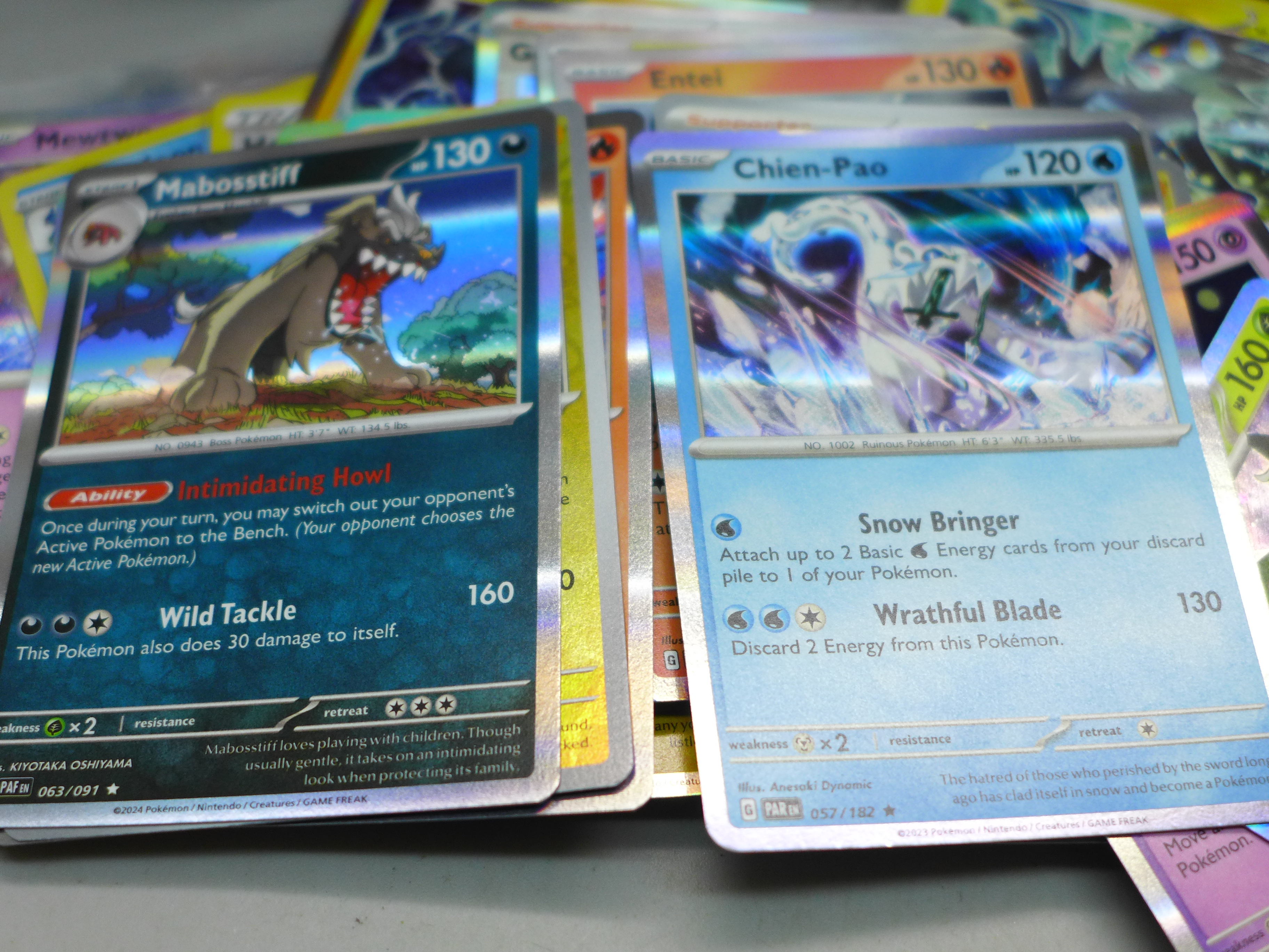 Over 700 Pokemon cards in tins, with holos (two tins) - Image 4 of 4