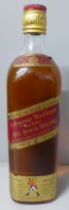 A bottle of Johnnie Walker Red Label Old Scotch Whisky, SB994S16 UCB raised backstamp (in vendor's
