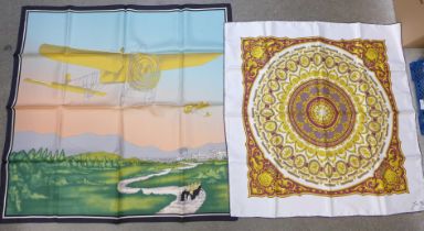 A collection of four lady's silk scarves including two Singapore Batik, packaged