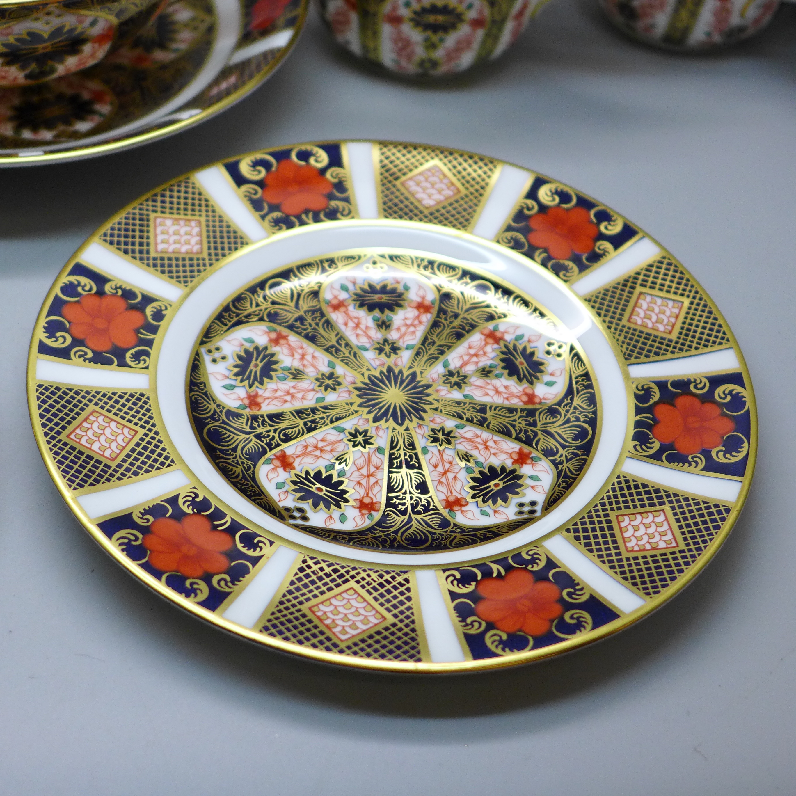 A collection of Royal Crown Derby 1128 pattern Imari; two tea plates, three large saucers, two - Image 2 of 5
