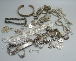 A collection of silver jewellery including two charm bracelets, 248g
