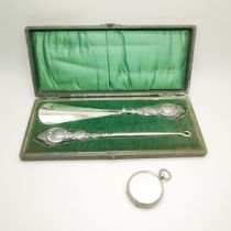 A silver mounted button hook and shoe horn and a silver fob watch